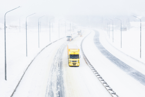 truck driving in a poor weather condition